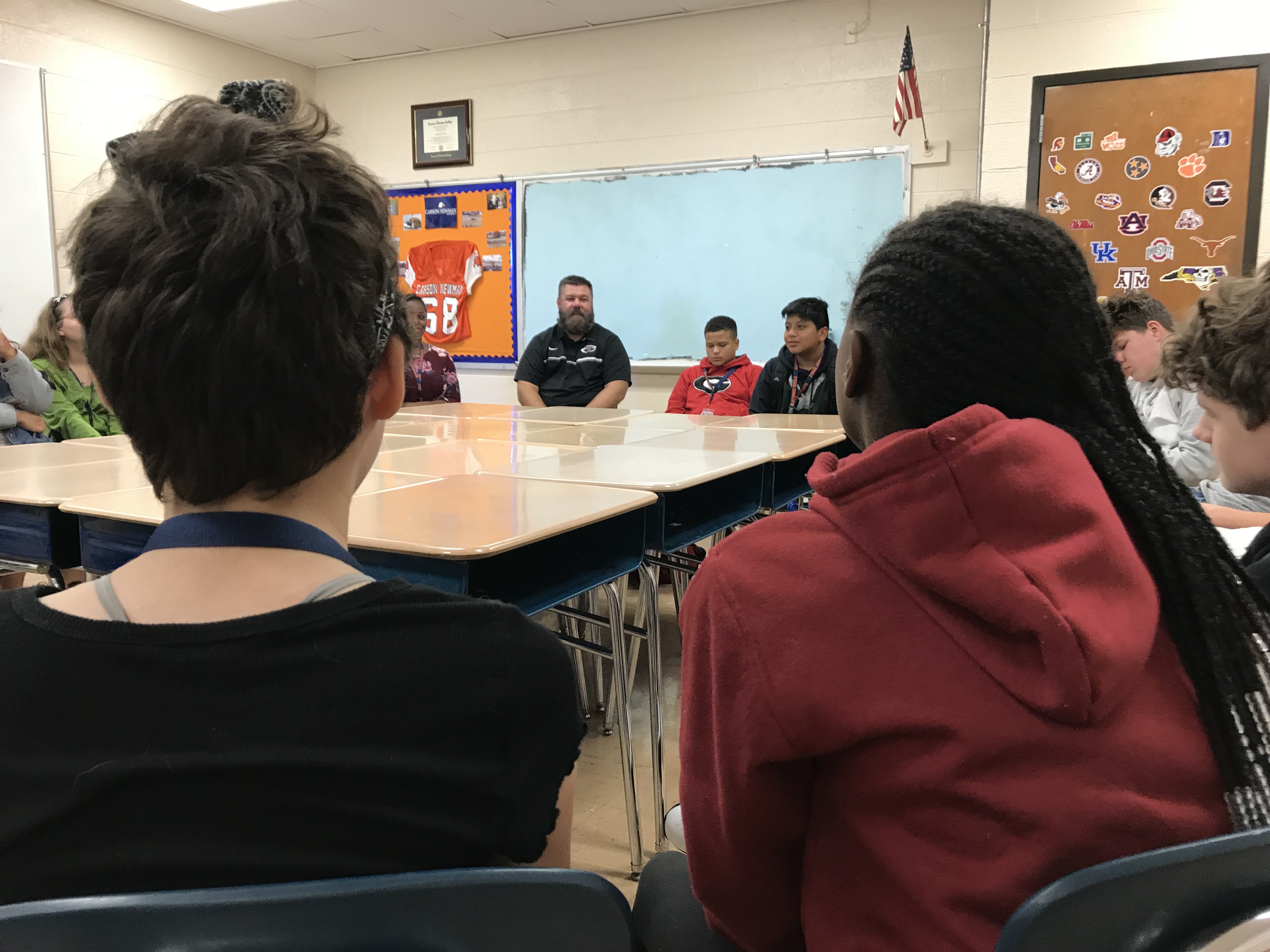 Northwest Middle School teacher Jason West leads a conversation circle on Oct. 19, 2018. 